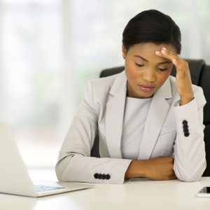 stressed female employee worker overworked wellness health mental