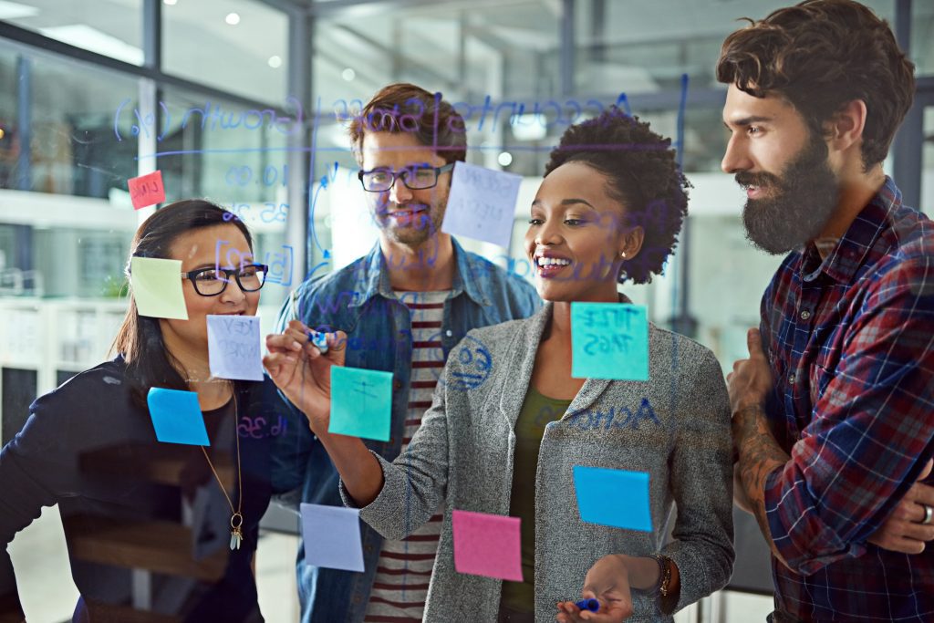 A business team planning strategies Its All About Strategic Planning Cropped Shot Of Coworkers Brainstorming and training and developing 