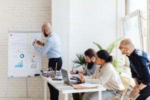 team employees working together in a meeting on strategy