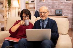 senior employees working on laptop