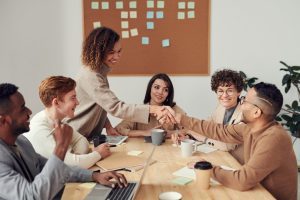 workplace culture productive employees team support acknowledge reward https://www.pexels.com/photo/colleagues-shaking-each-other-s-hands-3184291/