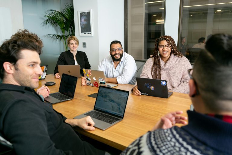 team hr productive culture work workplace leadership https://unsplash.com/photos/four-people-all-on-laptops-two-men-and-two-women-listen-to-person-talking-in-a-board-meeting-ZT5v0puBjZI?utm_content=creditCopyText&utm_medium=referral&utm_source=unsplash