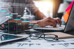 data analytics hr technology digital transformation Concept marketing plan, Project management schedule plan diagram, sales, marketing. Businessman is schedule a work plan each month on laptop computer at workplace.