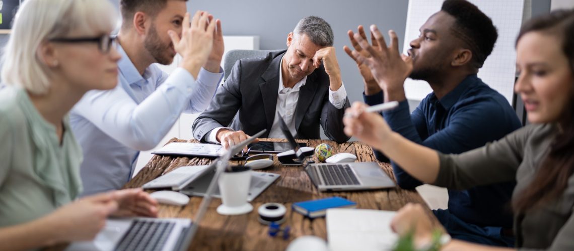 Frustrated Businessman During A Business Meeting In Office