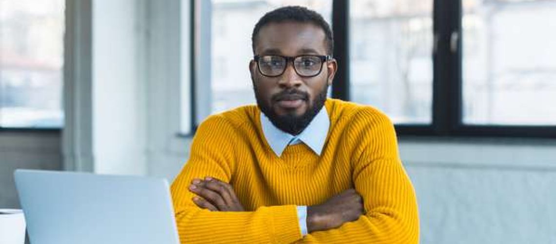 Businessman_sitting_confidently