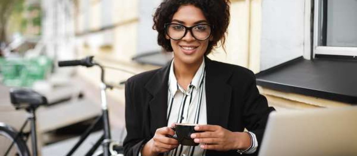 Businesswoman working at coffee shop