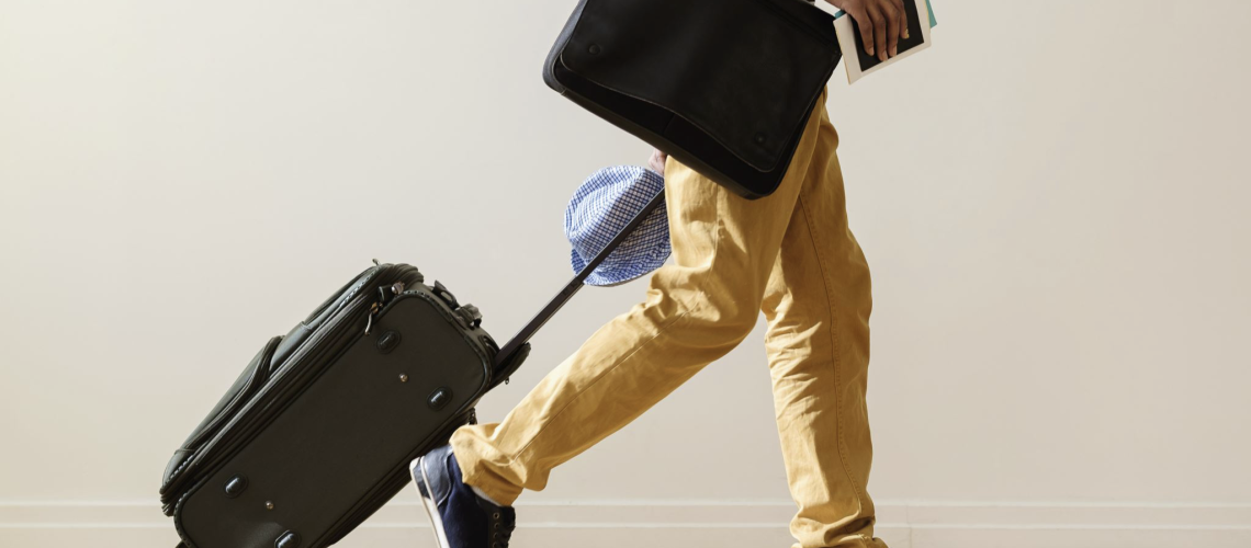 Employee relocating different country travel work photo credit- Microsoft Stock Images)