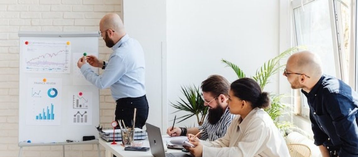 team employees working together in a meeting on strategy