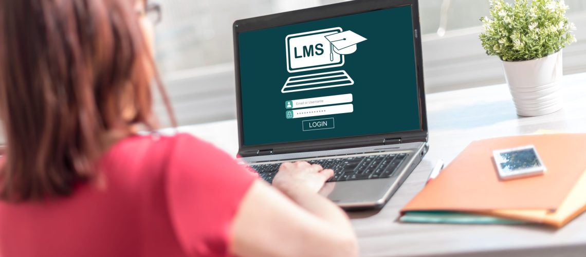 Lms concept on a laptop screen learning training e-learning