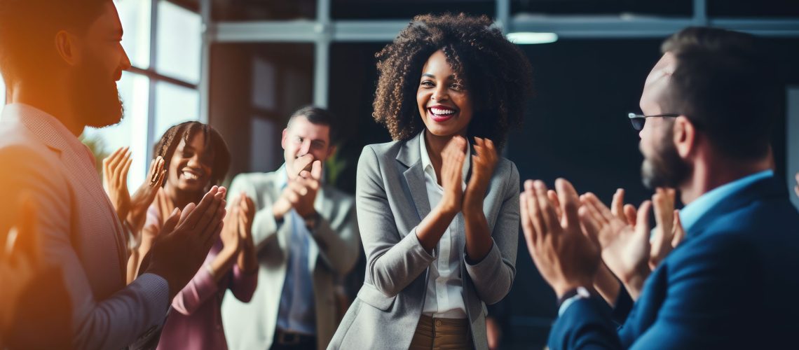 Employees Applauding to celebrate the success of what they have accomplished using Generative AI to help manage their talent happy work environment reward recognition culture positive clapping congratulate employees career hr departments