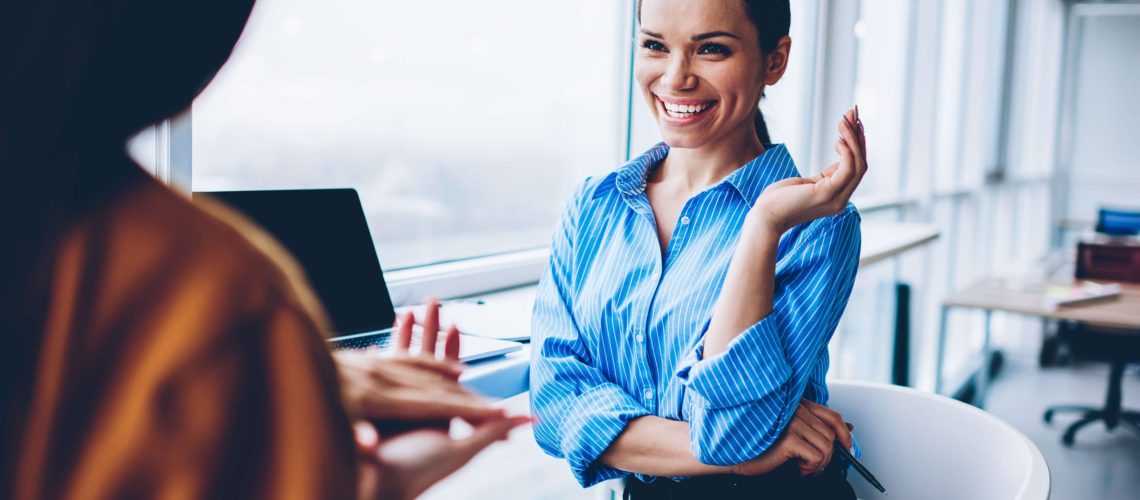 businesswomen chatting happy office work