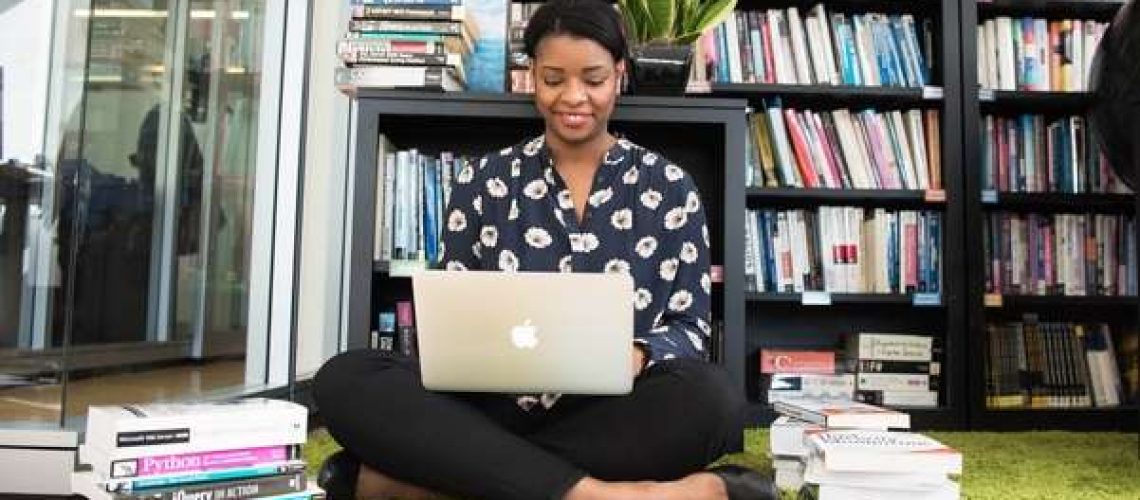 laptop and book shelves