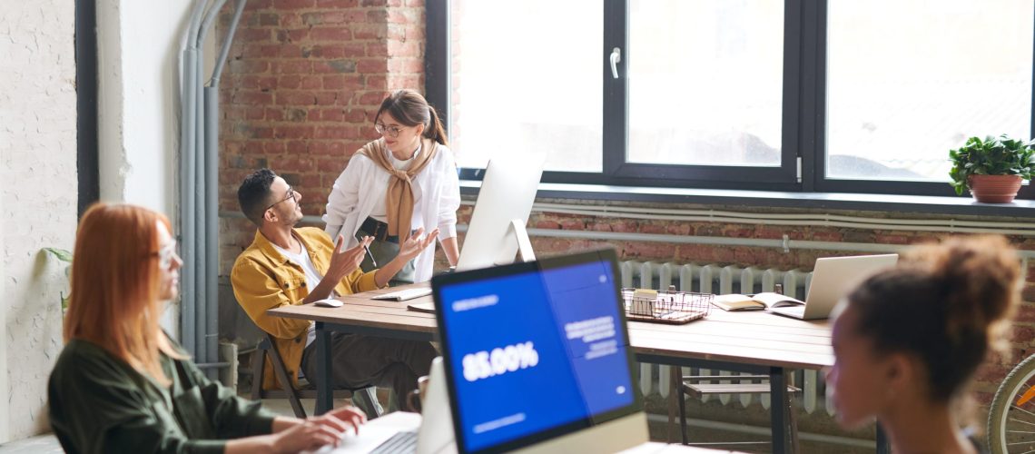 people-working-in-front-of-computer-3182763