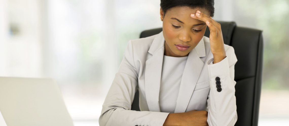 stressed female employee worker overworked wellness health mental