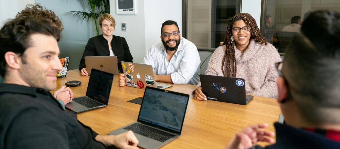 team hr productive culture work workplace leadership https://unsplash.com/photos/four-people-all-on-laptops-two-men-and-two-women-listen-to-person-talking-in-a-board-meeting-ZT5v0puBjZI?utm_content=creditCopyText&utm_medium=referral&utm_source=unsplash