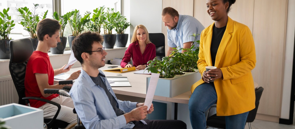 team members employess working together team work open office disability safety