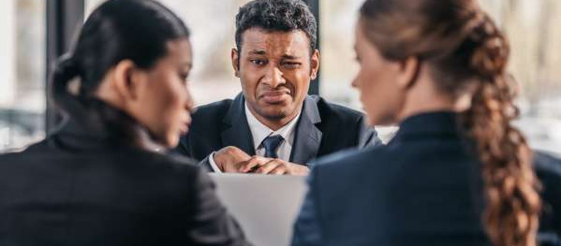 workers meeting upset employee