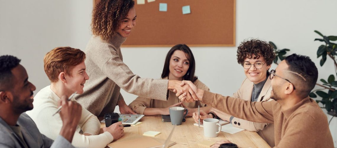 workplace culture productive employees team support acknowledge reward https://www.pexels.com/photo/colleagues-shaking-each-other-s-hands-3184291/